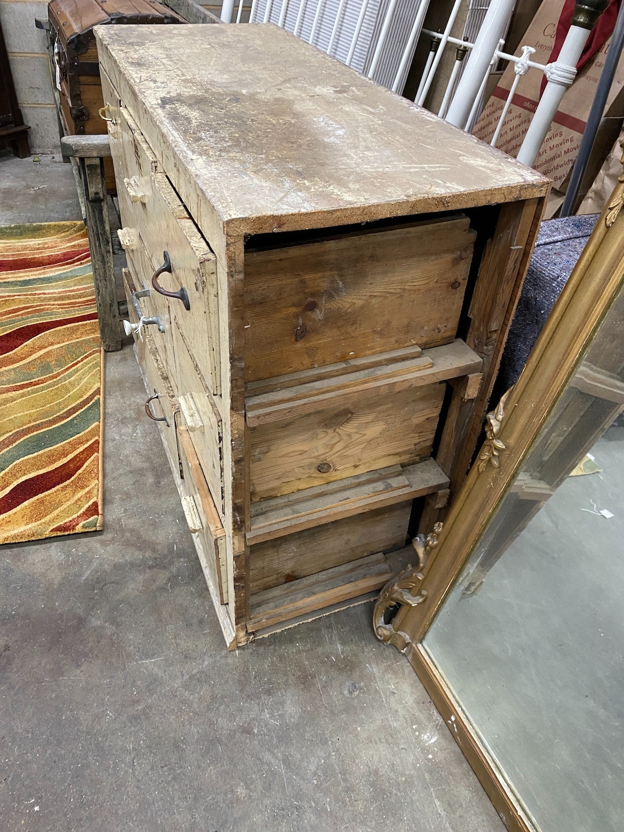 A small Victorian painted pine nine drawer chest, width 112cm, depth 45cm, height 92cm